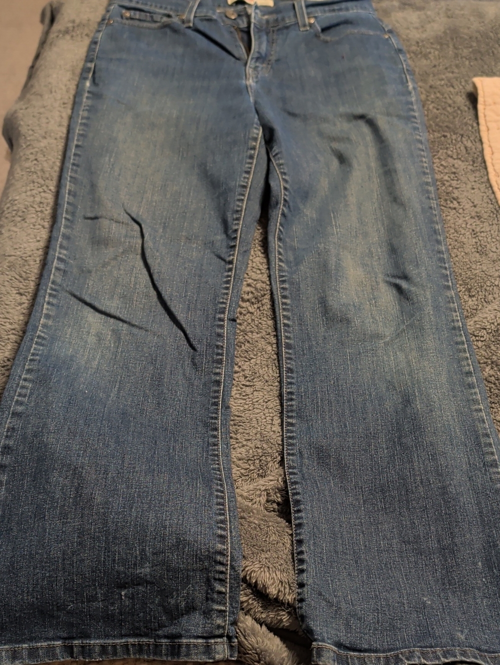 Levi's Medium Blue Bootcut Jeans with Subtle Whiskering